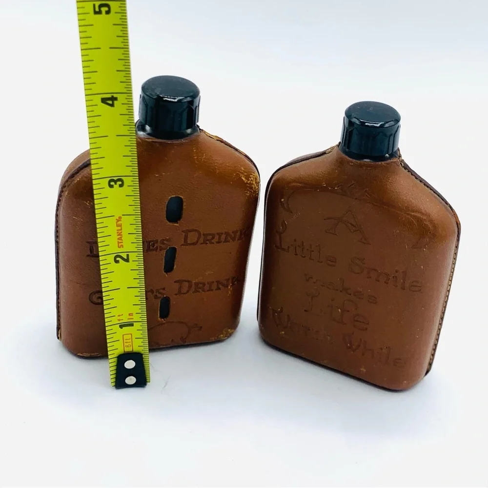 Pair Of Vintage Souvenir Leather Wrapped Glass Whiskey Flasks